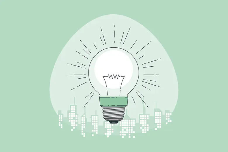 La ilustración muestra a una bombilla de luz iluminando a toda una ciudad.